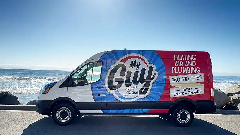 My Guy trucked parked by the ocean.