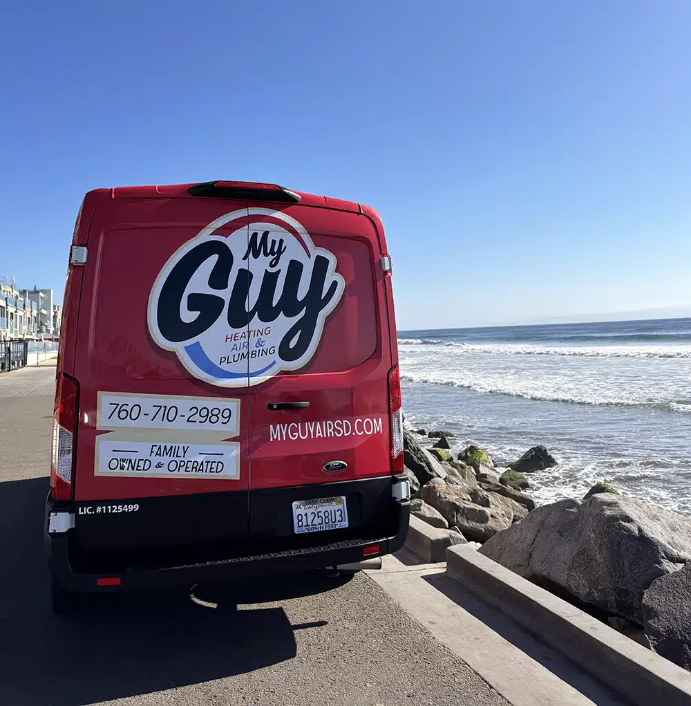 My Guy trucked parked by the ocean.